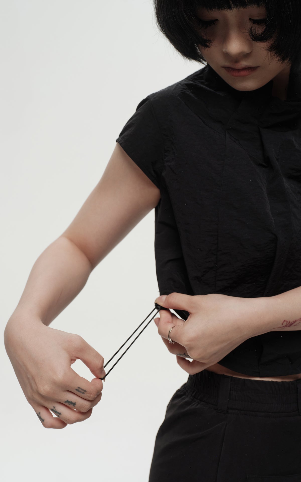 1. "PETALS" Wind/Oil/Water Proof Crop Top - Black