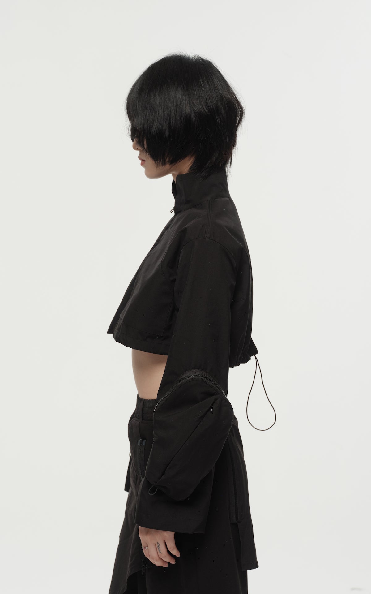 1. "REI" 3L Waterproof Cropped Jacket with Removable Bag