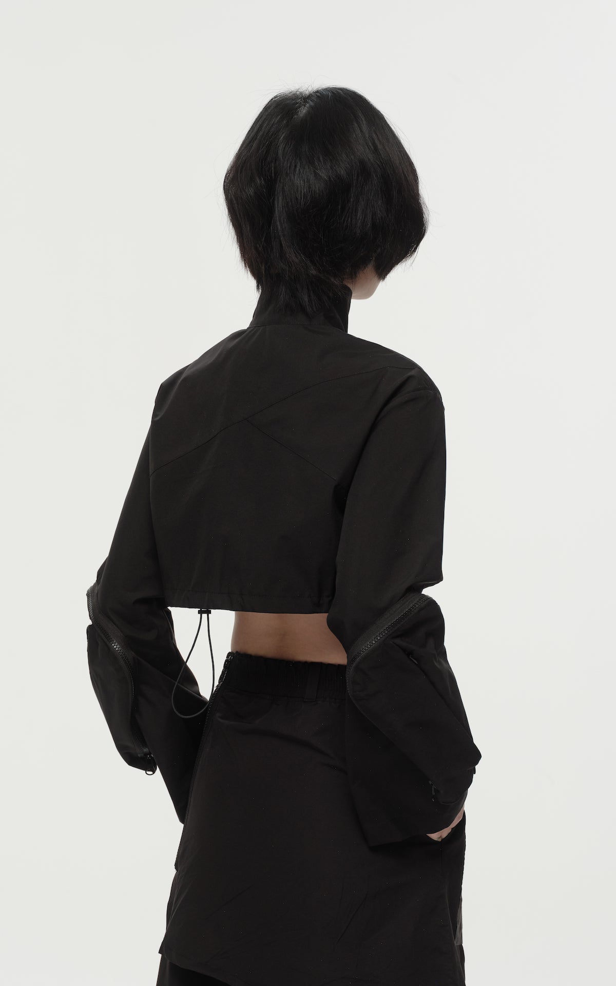 1. "REI" 3L Waterproof Cropped Jacket with Removable Bag