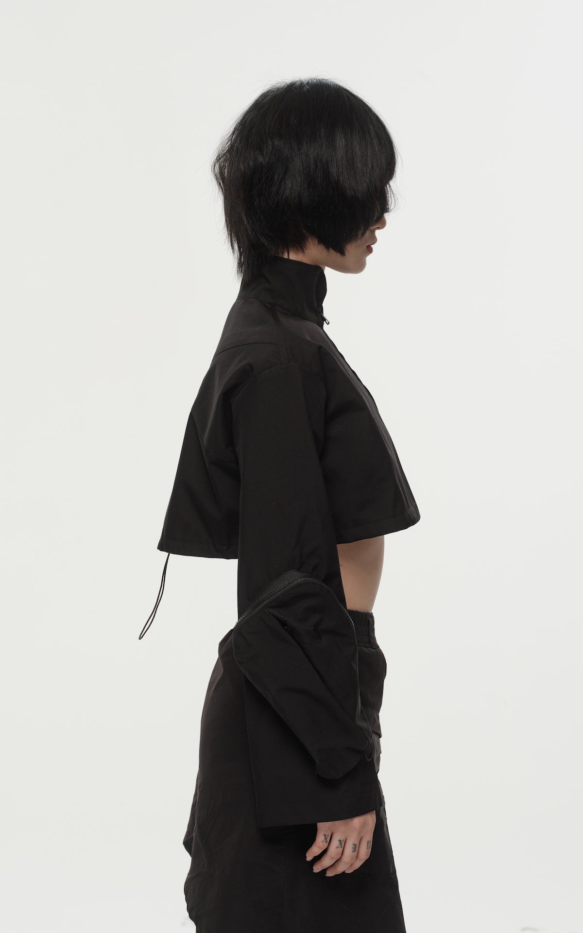 1. "REI" 3L Waterproof Cropped Jacket with Removable Bag