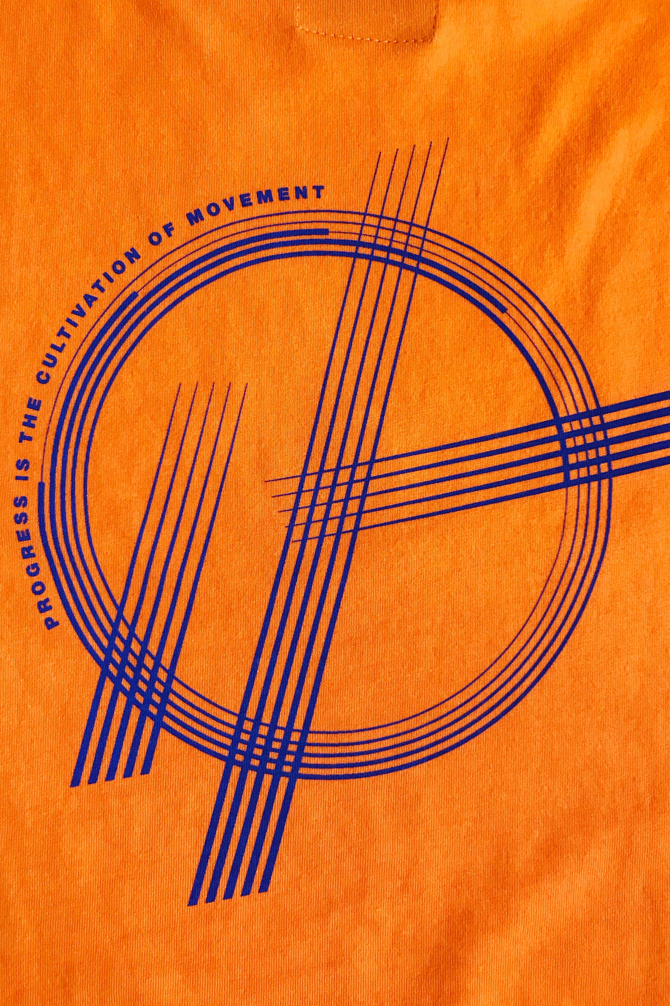 2. "Progression" Orange Tee